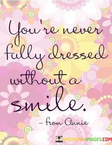 The quote humorously suggests that a smile is an essential accessory for a complete and confident appearance. It implies that no matter what one wears, a genuine smile adds a touch of charm and completeness to their overall demeanor. The quote celebrates the significance of a positive attitude in making a lasting impression.

This quote reflects the concept of the impact of emotions on our outward presentation. It implies that a smile can enhance our interactions and how we are perceived by others.

Ultimately, the quote highlights the transformative power of a smile in enhancing one's appearance and interactions. It's a playful reminder that the simplest gestures, like a smile, can have a profound influence on our interactions and leave a lasting positive impression on those around us.